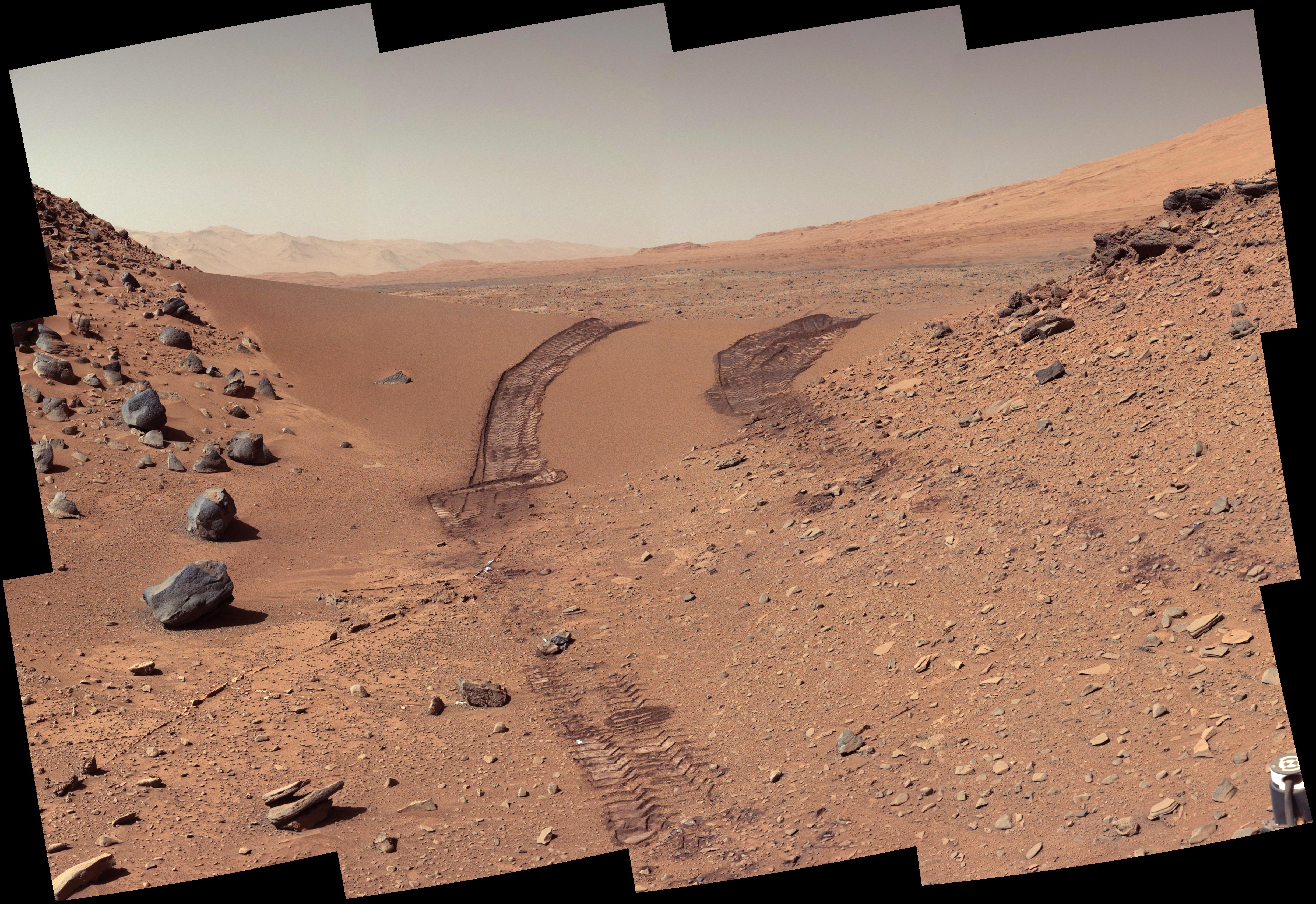 Tracks in the Martian soil left by the Curiosity rover. Credit: NASA/JPL-Caltech/MSSS